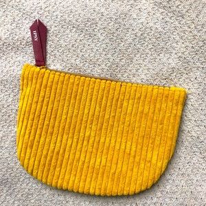 Yellow and maroon Ipsy bag